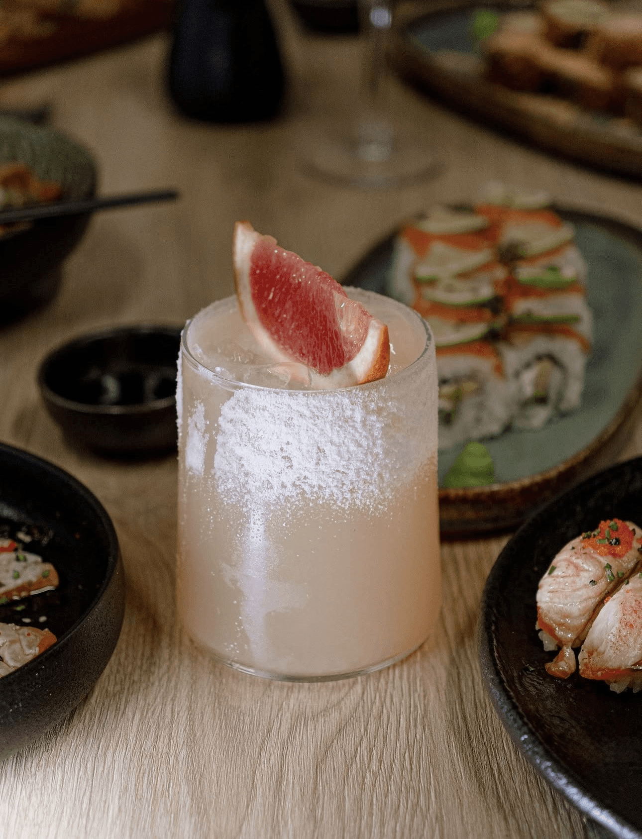 Signature grapefruit cocktail with sushi